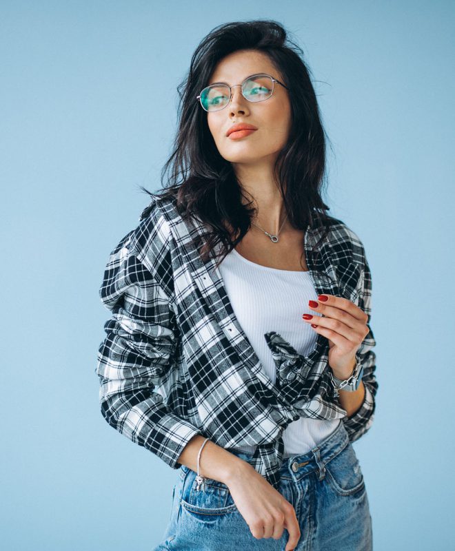 Young beautiful woman in casual outfit isolated in studio Young beautiful woman in casual outfit isolated in studio
